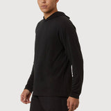 Man wearing a black hoodie and shorts on a white background
