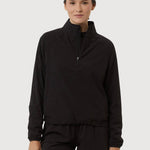 Person wearing a black outfit on a white background