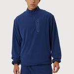 Person wearing a blue tracksuit on a white background