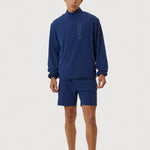 Person wearing a blue athletic outfit on a white background