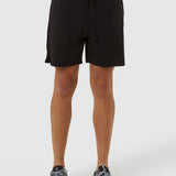 Person wearing black shorts on a white background