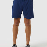 Person wearing blue shorts on a white background