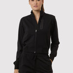 Person wearing a black tracksuit on a white background