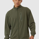 Man wearing a green tracksuit on a white background