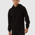 Person wearing a black hoodie on a white background