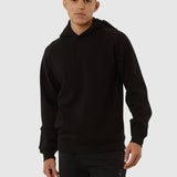 Person wearing a black hoodie on a white background